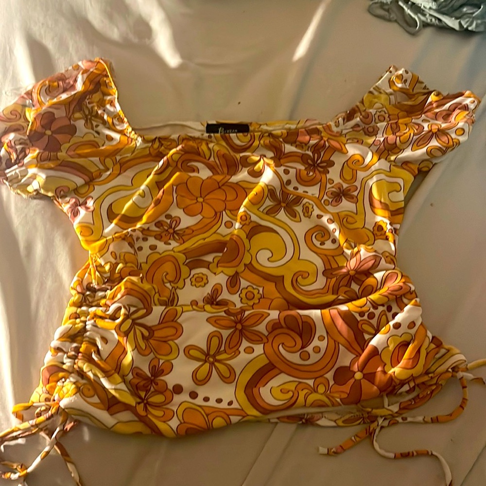 Multi colored cute blouse with puff sleeves size medium